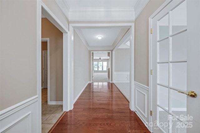 8409 Darcy Hopkins Dr, Charlotte, NC 28277 - hall with wood finished floors, ornamental molding, and a wainscoted wall