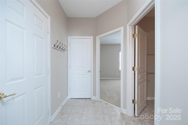 8409 Darcy Hopkins Dr, Charlotte, NC 28277 - corridor with light tile patterned floors and baseboards