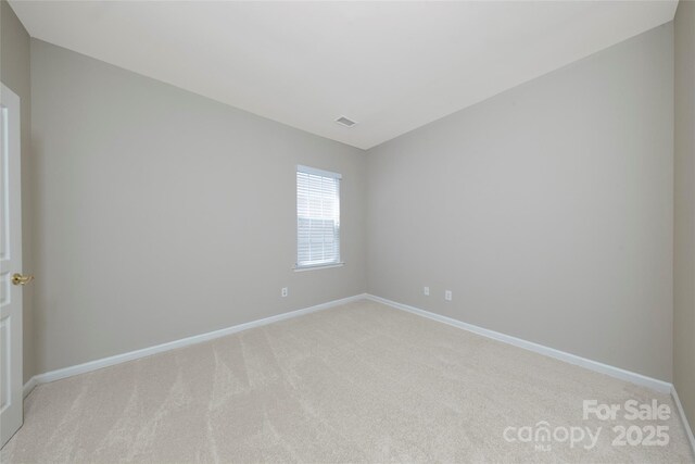8409 Darcy Hopkins Dr, Charlotte, NC 28277 - empty room with light colored carpet and baseboards