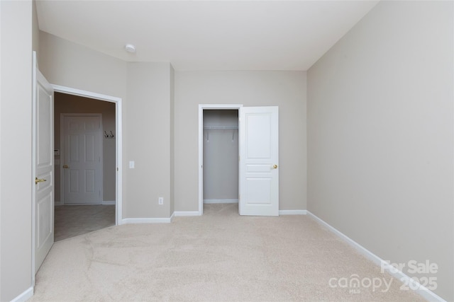 8409 Darcy Hopkins Dr, Charlotte, NC 28277 - unfurnished bedroom featuring light colored carpet and a closet