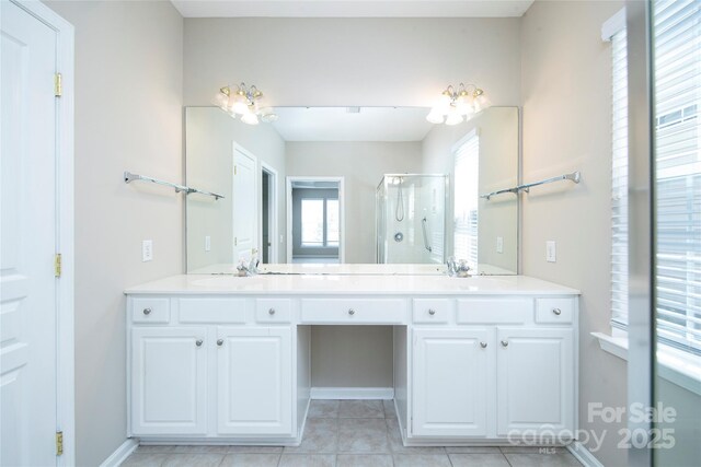 8409 Darcy Hopkins Dr, Charlotte, NC 28277 - bathroom featuring double vanity, a stall shower, and tile patterned flooring
