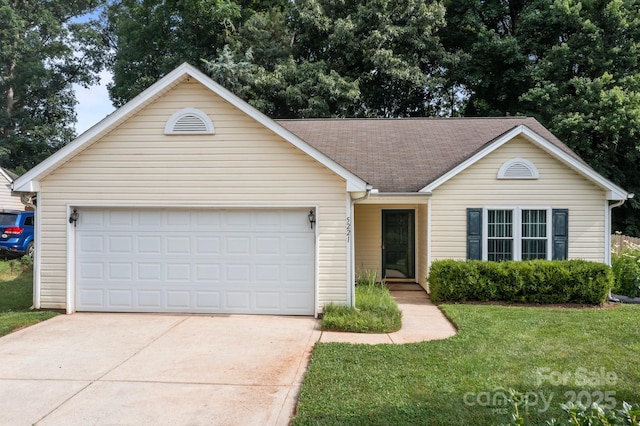 5221 Javitz Rd, Charlotte, NC 28216 - ranch-style home featuring concrete driveway, a garage, a front lawn, and a shingled roof