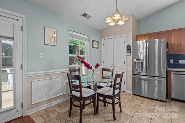 5221 Javitz Rd, Charlotte, NC 28216 - dining room featuring a chandelier