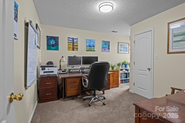 5221 Javitz Rd, Charlotte, NC 28216 - carpeted home office with a textured ceiling and baseboards