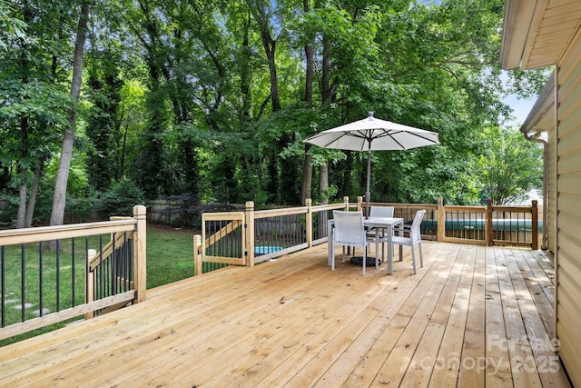 5221 Javitz Rd, Charlotte, NC 28216 - wooden terrace featuring outdoor dining space and a yard