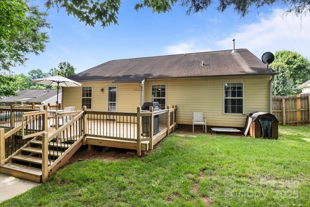5221 Javitz Rd, Charlotte, NC 28216 - back of house with a deck and roof with shingles