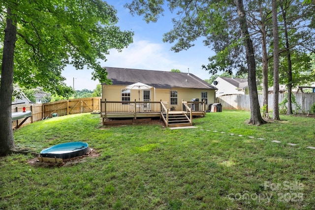 5221 Javitz Rd, Charlotte, NC 28216 - rear view of property featuring a fenced backyard and a wooden deck