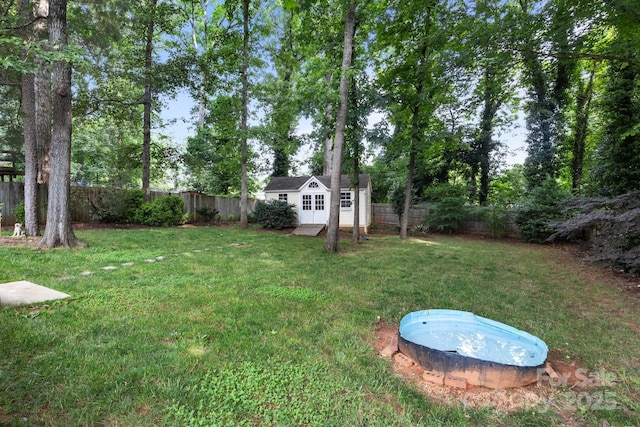 5221 Javitz Rd, Charlotte, NC 28216 - fenced backyard with an outbuilding
