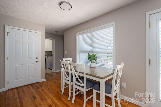 104 Nottingham Dr, Maiden, NC 28650 - dining room featuring light wood-style flooring and a textured ceiling