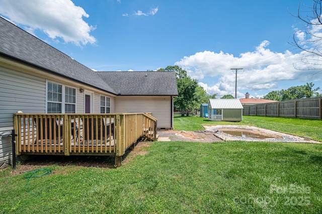 104 Nottingham Dr, Maiden, NC 28650 - view of yard with a wooden deck and a storage shed