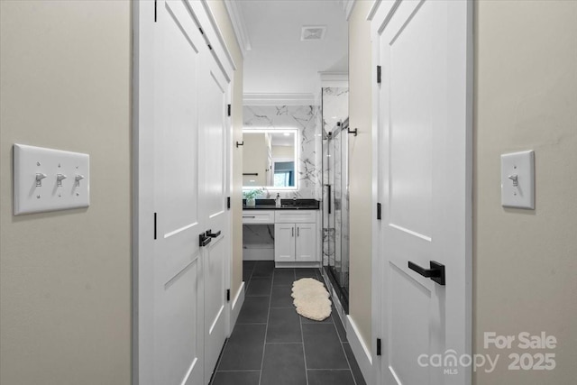 402 Wildlife Rd, Troutman, NC 28166 - hallway featuring dark tile patterned floors and baseboards