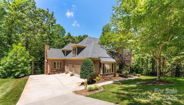 10007 Hillspring Dr, Huntersville, NC 28078 - view of front of property featuring an attached garage, a chimney, brick siding, a front lawn, and driveway