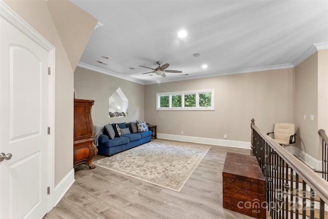 10007 Hillspring Dr, Huntersville, NC 28078 - living room featuring ceiling fan, crown molding, light wood-style floors, and recessed lighting