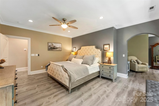 10007 Hillspring Dr, Huntersville, NC 28078 - bedroom featuring arched walkways, ornamental molding, light wood-type flooring, recessed lighting, and ceiling fan
