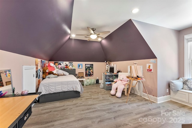 10007 Hillspring Dr, Huntersville, NC 28078 - bedroom featuring wood finished floors, vaulted ceiling, recessed lighting, and ceiling fan