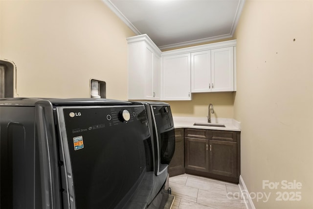 10007 Hillspring Dr, Huntersville, NC 28078 - laundry area featuring washer and dryer, ornamental molding, cabinet space, and light marble finish floors
