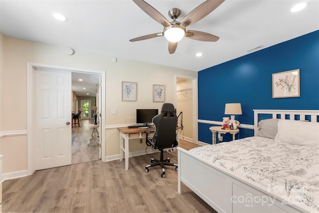10007 Hillspring Dr, Huntersville, NC 28078 - bedroom featuring light wood-type flooring, recessed lighting, a desk, and a ceiling fan