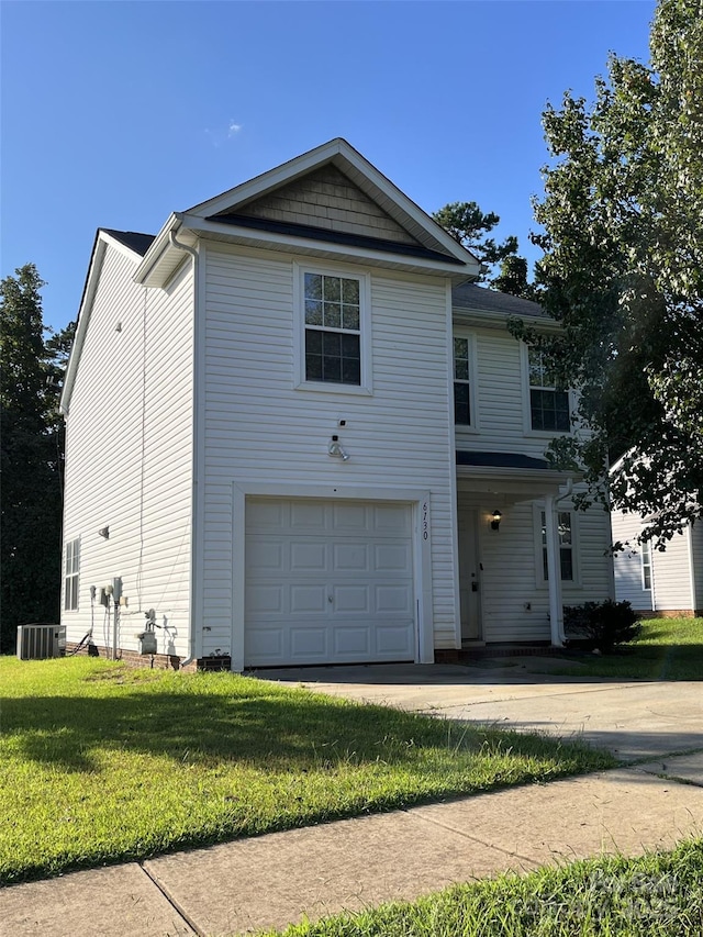 6130 Sid Crane Dr, Charlotte, NC 28216 - view of front of property with an attached garage, a front yard, and driveway