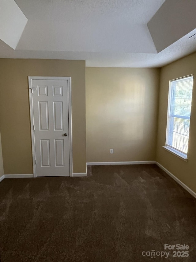 6130 Sid Crane Dr, Charlotte, NC 28216 - empty room featuring carpet flooring and vaulted ceiling