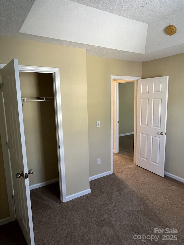 6130 Sid Crane Dr, Charlotte, NC 28216 - unfurnished bedroom with carpet floors, a closet, and a textured ceiling