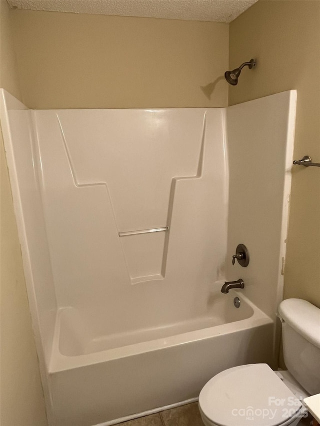 6130 Sid Crane Dr, Charlotte, NC 28216 - bathroom with shower / tub combination, a textured ceiling, and tile patterned flooring