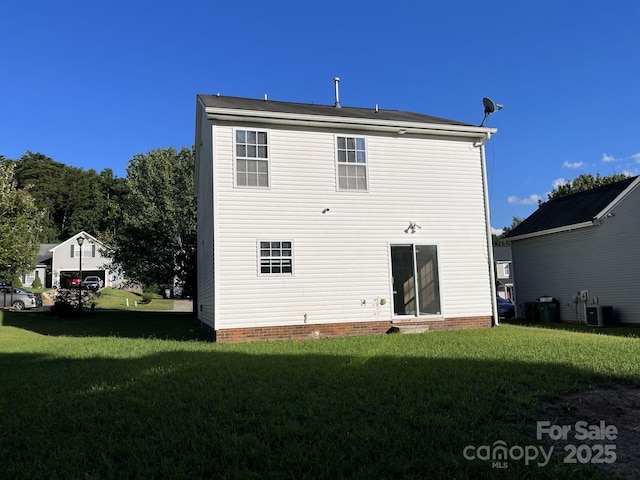 6130 Sid Crane Dr, Charlotte, NC 28216 - back of house with a lawn