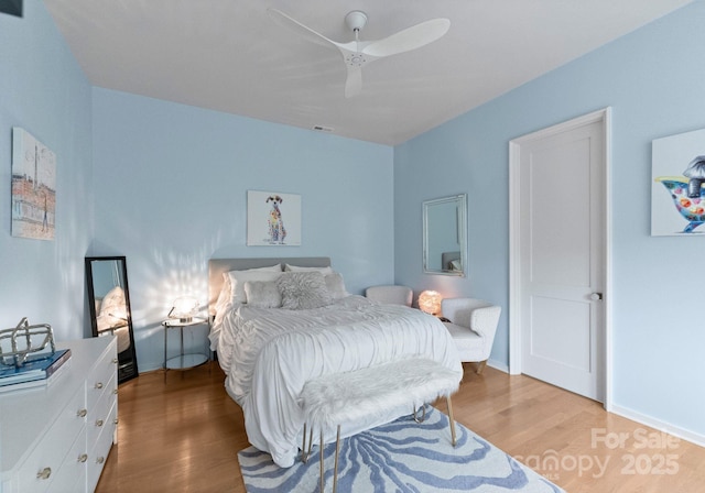 2837 Kenwood Sharon Ln, Charlotte, NC 28211 - bedroom featuring wood finished floors and a ceiling fan
