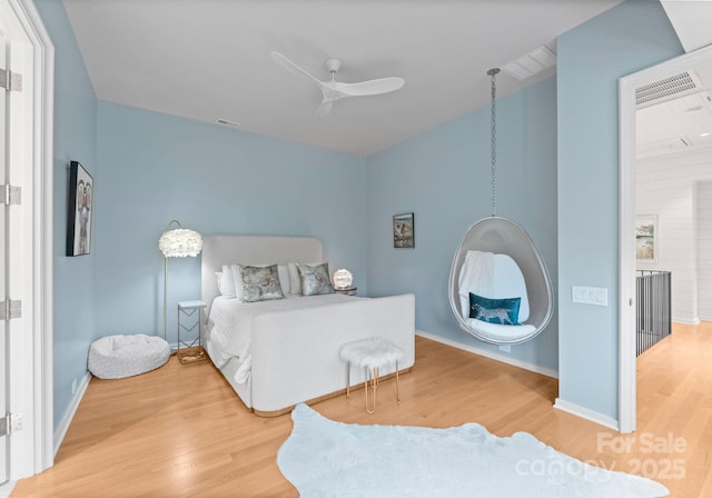 2837 Kenwood Sharon Ln, Charlotte, NC 28211 - bedroom with wood finished floors and ceiling fan