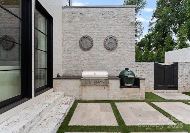 2837 Kenwood Sharon Ln, Charlotte, NC 28211 - view of patio / terrace featuring exterior kitchen