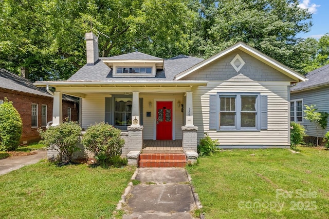 524 W Horah St, Salisbury, NC 28144 - bungalow-style home featuring a porch, a front lawn, a chimney, and roof with shingles