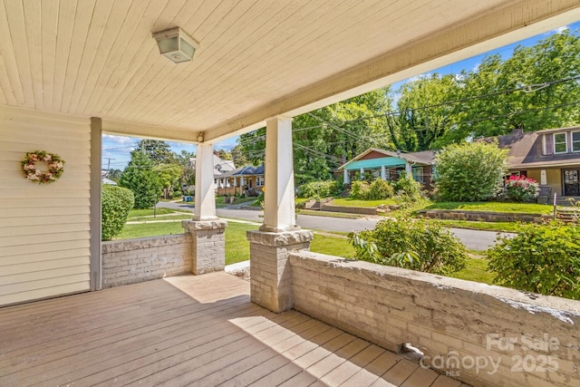 524 W Horah St, Salisbury, NC 28144 - wooden porch featuring a lawn