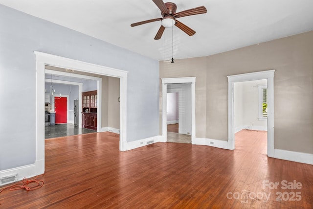 524 W Horah St, Salisbury, NC 28144 - empty room with ceiling fan and wood finished floors