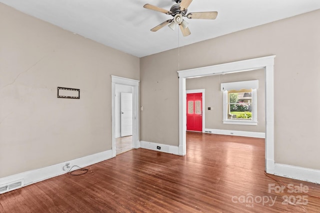 524 W Horah St, Salisbury, NC 28144 - empty room with wood finished floors and a ceiling fan