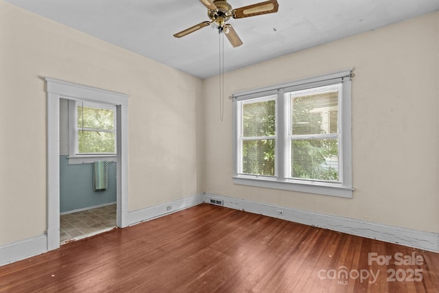 524 W Horah St, Salisbury, NC 28144 - empty room featuring hardwood / wood-style flooring and ceiling fan
