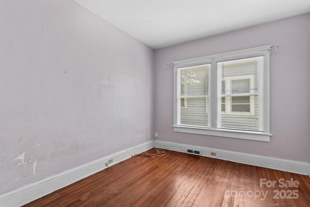 524 W Horah St, Salisbury, NC 28144 - empty room with hardwood / wood-style floors and baseboards