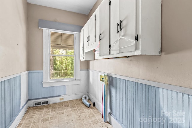 524 W Horah St, Salisbury, NC 28144 - washroom featuring a wainscoted wall and cabinet space