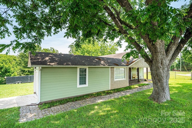 166 Duke St, Granite Falls, NC 28630 - view of property exterior with a lawn