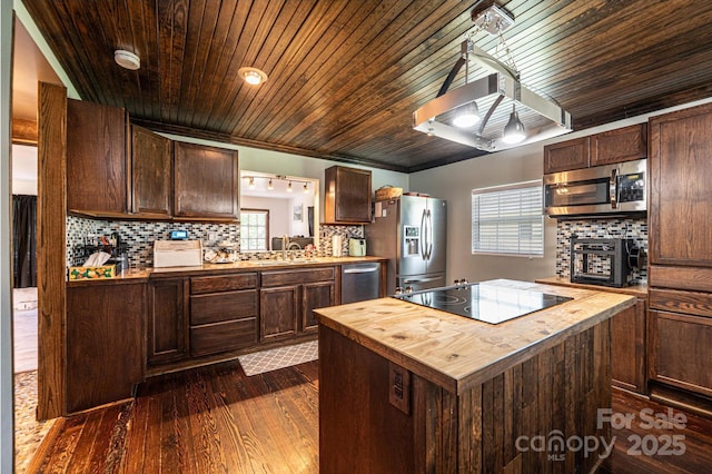 166 Duke St, Granite Falls, NC 28630 - kitchen featuring wood counters, stainless steel appliances, wooden ceiling, tasteful backsplash, and a kitchen island
