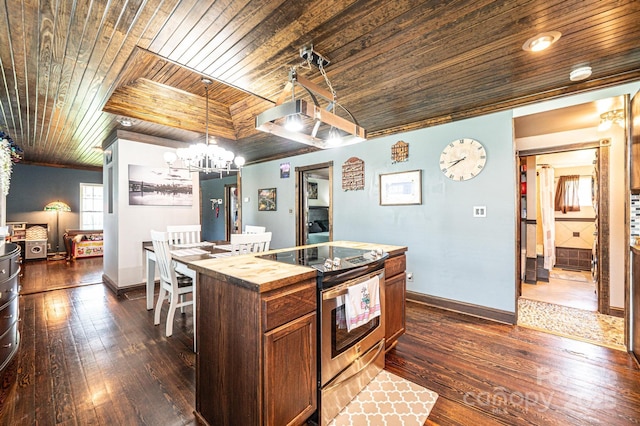 166 Duke St, Granite Falls, NC 28630 - kitchen with stainless steel electric range oven, wood ceiling, butcher block counters, dark wood finished floors, and a chandelier