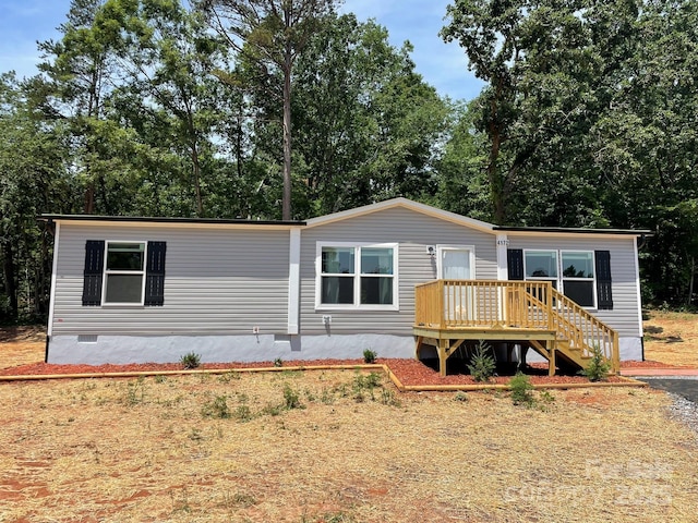 4172 Tallent Rd, Morganton, NC 28655 - manufactured / mobile home featuring crawl space, a deck, and view of wooded area