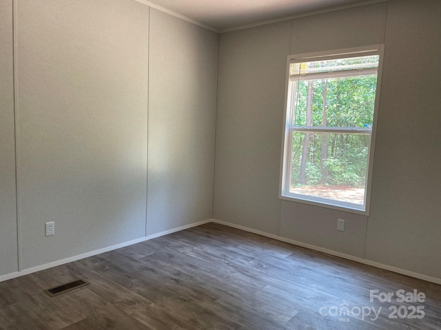 4172 Tallent Rd, Morganton, NC 28655 - unfurnished room featuring dark wood-style floors and ornamental molding