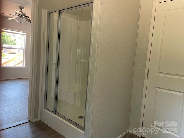 4180 Tallent Rd, Morganton, NC 28655 - bathroom featuring a shower stall, wood finished floors, and ceiling fan