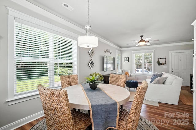 11359 Deer Ridge Ln, Charlotte, NC 28277 - dining room with dark wood-style floors, crown molding, and a ceiling fan
