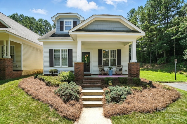 11359 Deer Ridge Ln, Charlotte, NC 28277 - craftsman-style home with a porch and a front yard