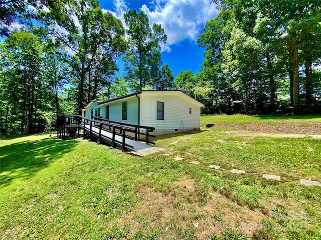 325 Scaley Bark Dr, Salisbury, NC 28147 - view of property exterior with a lawn, a deck, and crawl space