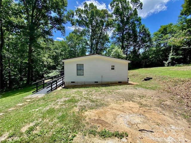 325 Scaley Bark Dr, Salisbury, NC 28147 - view of side of home featuring crawl space and a yard