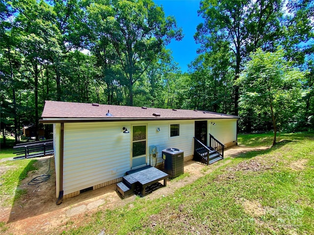 325 Scaley Bark Dr, Salisbury, NC 28147 - back of property featuring crawl space, entry steps, and a yard
