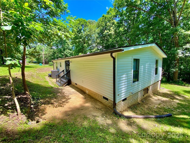 325 Scaley Bark Dr, Salisbury, NC 28147 - view of property exterior with crawl space and view of scattered trees