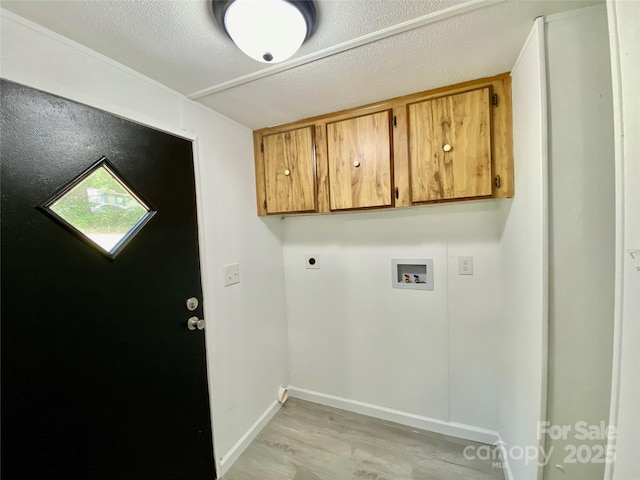 325 Scaley Bark Dr, Salisbury, NC 28147 - laundry room with hookup for a washing machine, light wood finished floors, cabinet space, and hookup for an electric dryer