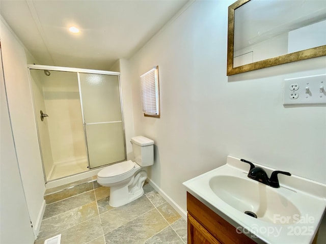 325 Scaley Bark Dr, Salisbury, NC 28147 - bathroom featuring vanity, a shower stall, and stone finish floors